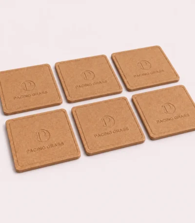Bamboo Coasters Set of 6 in sandy brown matte finish on a wooden table