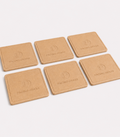 Bamboo Coasters Set of 6 in sandy brown matte finish on a wooden table