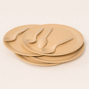 Dinner Plate Set – 4 bamboo dinner plates with spoons on a dining table